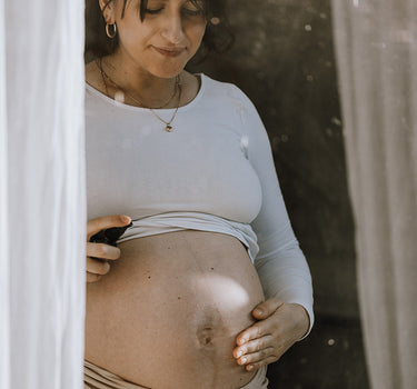 Strækmærker under graviditeten – hvad er det, og hvorfor får du dem?
